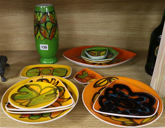 A Poole Pottery Delphis green ground vase, three similar dishes, four yellow ground dishes and four orange dishes(14).